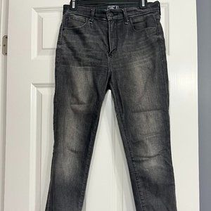 Abercrombie Super High Rise Skinny in black wash, raw hem, size 28/6p.